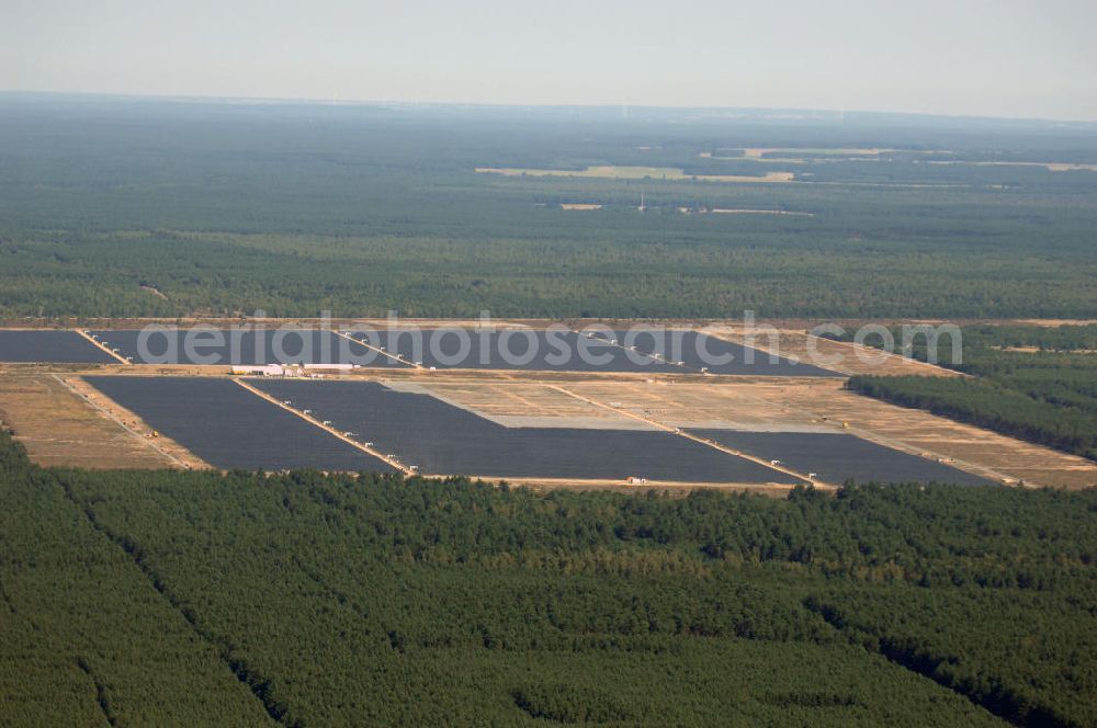 Aerial image Lieberose - Blick auf den ehemaligen Truppenübungsplatz Lieberose am Tag vor der offiziellen Inbetriebnahme der bisher zweitgrößte PV-Anlage der Welt durch die juwi Holding AG. Lieberose ist aber nicht nur in Leistung und Finanzierung beispielhaft, sondern auch ein Modellprojekt der Renaturierung militärischer Liegenschaften. Pressesprecher: Ralf Heidenreich; juwi Holding AG; Energie-Allee 1; D-55286 Wörrstadt; heidenreich@juwi.de