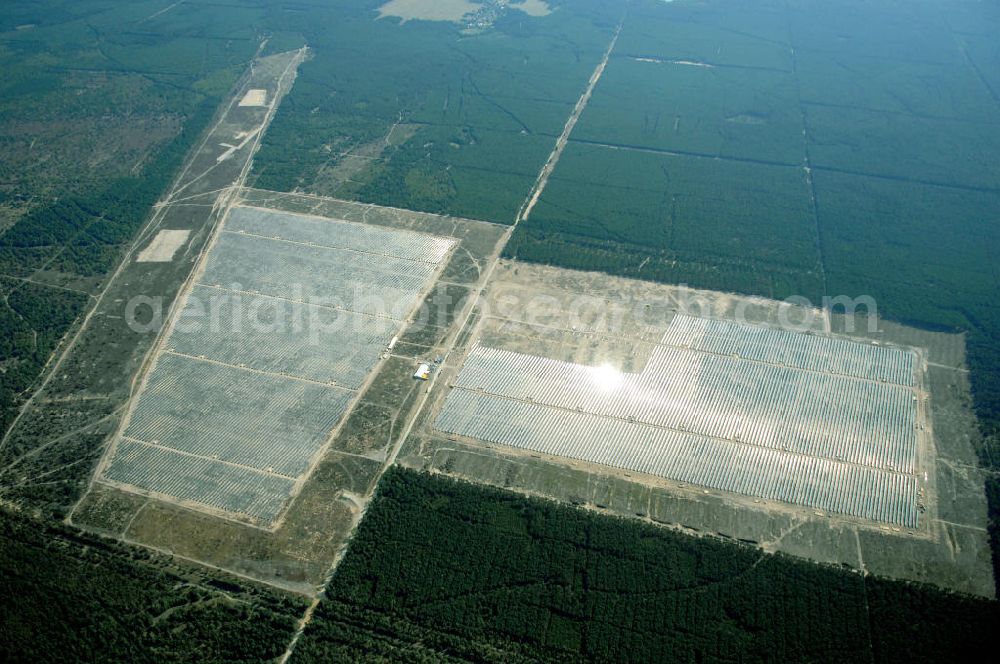 Aerial photograph Lieberose - Blick auf den ehemaligen Truppenübungsplatz Lieberose am Tag vor der offiziellen Inbetriebnahme der bisher zweitgrößte PV-Anlage der Welt durch die juwi Holding AG. Lieberose ist aber nicht nur in Leistung und Finanzierung beispielhaft, sondern auch ein Modellprojekt der Renaturierung militärischer Liegenschaften. Pressesprecher: Ralf Heidenreich; juwi Holding AG; Energie-Allee 1; D-55286 Wörrstadt; heidenreich@juwi.de