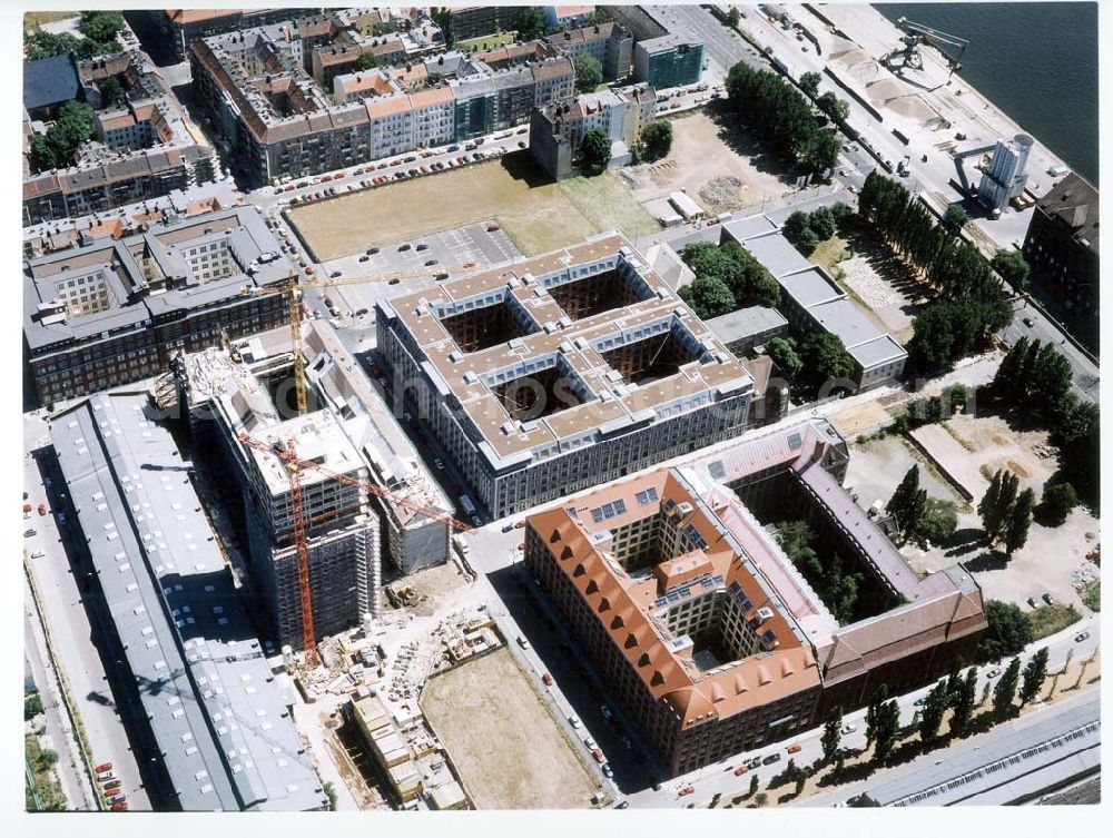 Aerial photograph Berlin - Friedrichshain - Fertigstellung der Geschäfts- und Wohnneubausiedlung Oberbaum-City an der Oberbaumbrücke in Berlin-Friedrichshain. -ehemaliges NARVA-Gelände !!