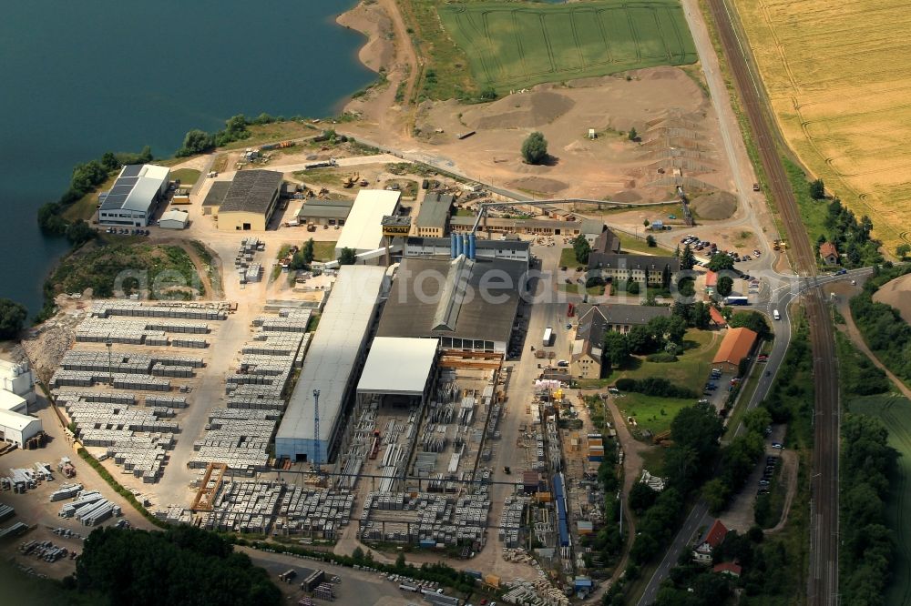 Heringen/Helme from the bird's eye view: Is the precast plant of Universal Concrete herring GmbH & Co. KG on the Nordhaeuser road of Heringen/Helme in the state of Thuringia. The work, produced in the precast concrete for civil engineering belongs to HABAU mbH