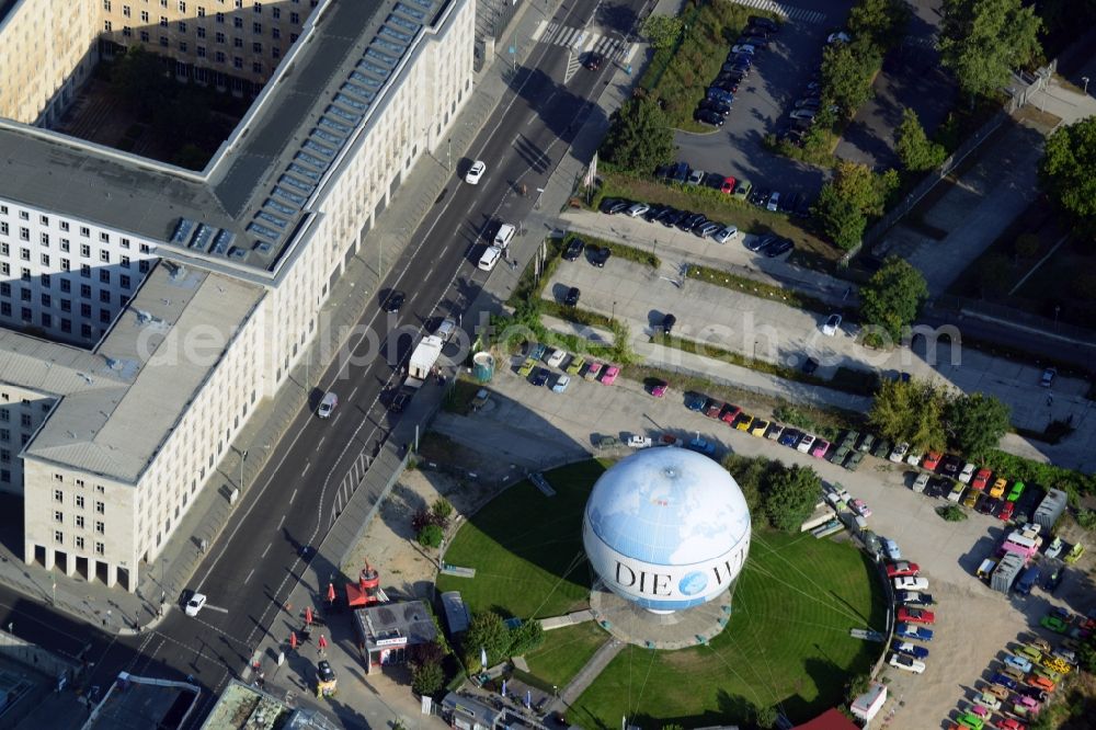 Aerial image Berlin Mitte - View of the DIE WELT, one of the largest captive helium balloons in the world with World-advertising. Air Service Berlin, the company operates the popular tourist attraction with a panoramic view of the City. With the rental station Trabant Berlin in the picture - the Trabant - car vehicle rental of the well-known GDR cult car