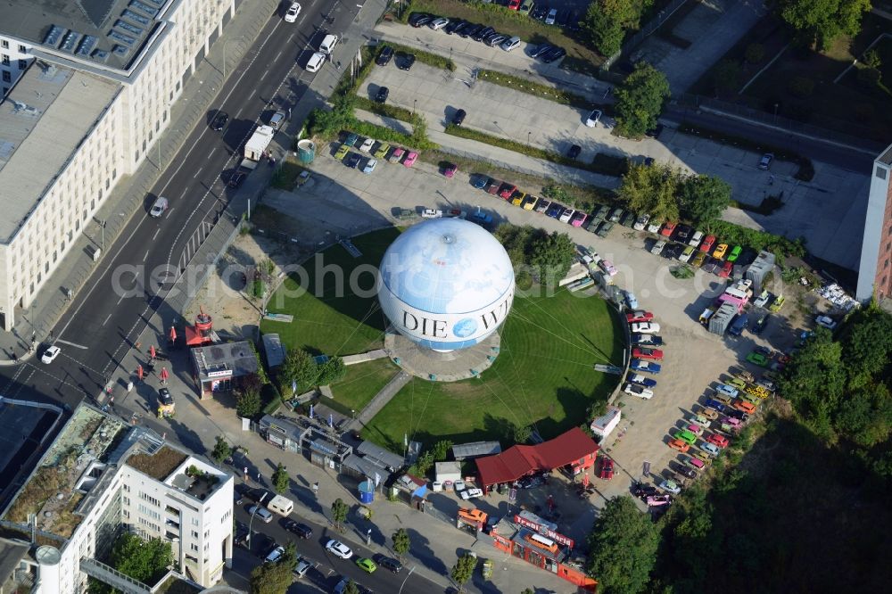 Berlin Mitte from above - View of the DIE WELT, one of the largest captive helium balloons in the world with World-advertising. Air Service Berlin, the company operates the popular tourist attraction with a panoramic view of the City. With the rental station Trabant Berlin in the picture - the Trabant - car vehicle rental of the well-known GDR cult car