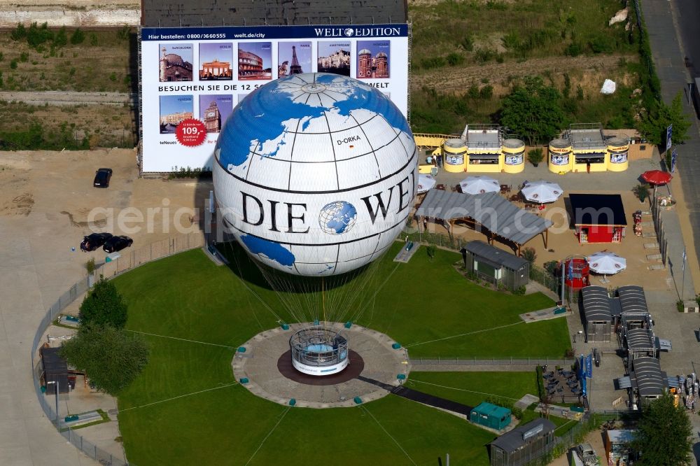 Berlin from above - View of the DIE WELT, one of the largest captive helium balloons in the world with World-advertising. Air Service Berlin, the company operates the popular tourist attraction with a panoramic view of the City