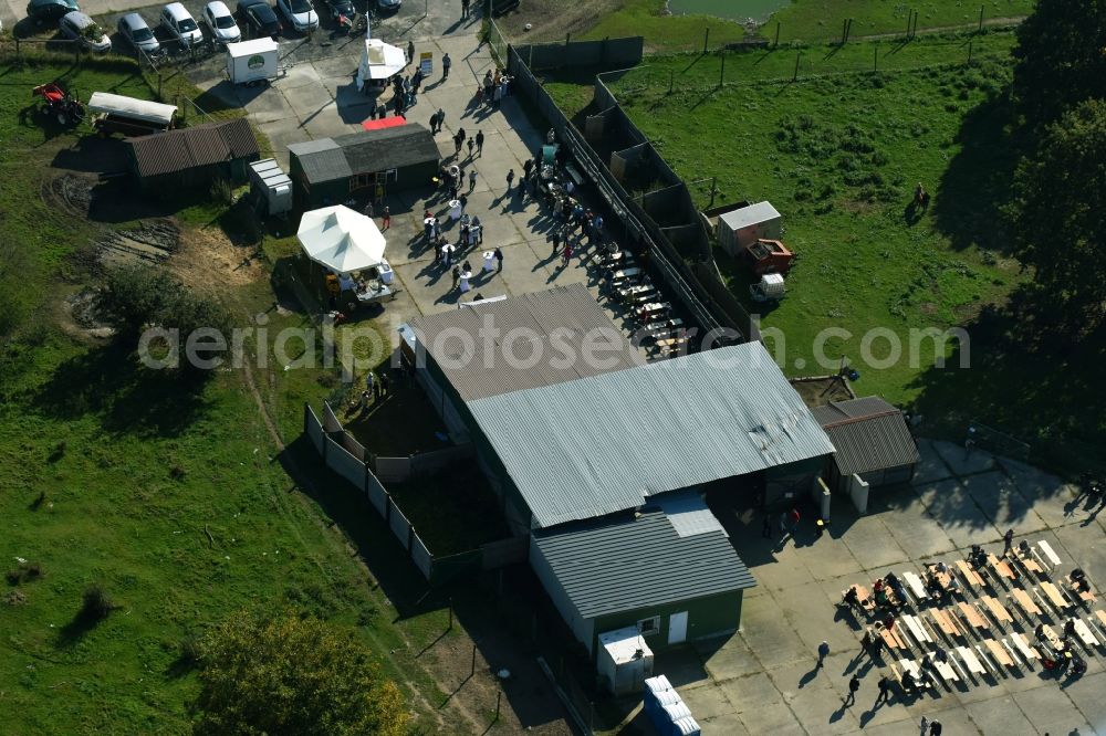 Aerial photograph Werneuchen - Animal breeding equipment Livestock for meat production Wildfarm Werneuchen in Werneuchen in the state Brandenburg, Germany