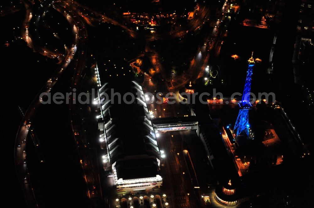 Aerial image Berlin - Festival of Lights downtown of the capital Berlin. Of October 10th to 21th numerous tourist and cultural attractions of the city are enveloped in a colorful light show. To be seen in the picture is the radio tower on the exhibition grounds in the district Charlottenburg