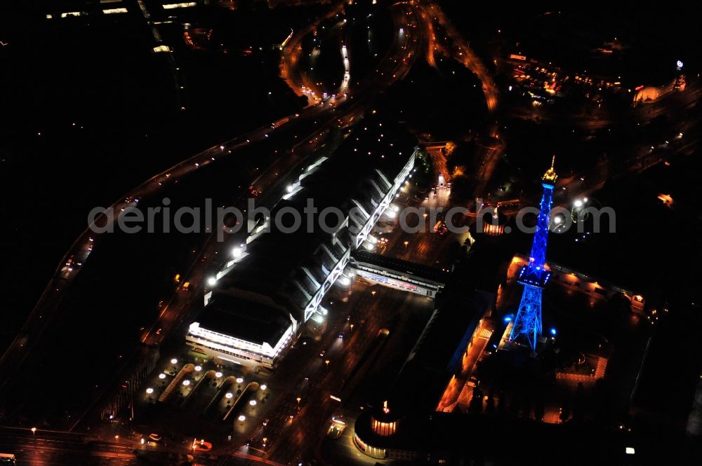 Aerial photograph Berlin - Festival of Lights downtown of the capital Berlin. Of October 10th to 21th numerous tourist and cultural attractions of the city are enveloped in a colorful light show. To be seen in the picture is the radio tower on the exhibition grounds in the district Charlottenburg