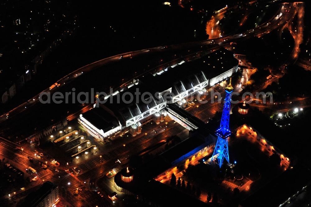 Berlin from above - Festival of Lights downtown of the capital Berlin. Of October 10th to 21th numerous tourist and cultural attractions of the city are enveloped in a colorful light show. To be seen in the picture is the radio tower on the exhibition grounds in the district Charlottenburg