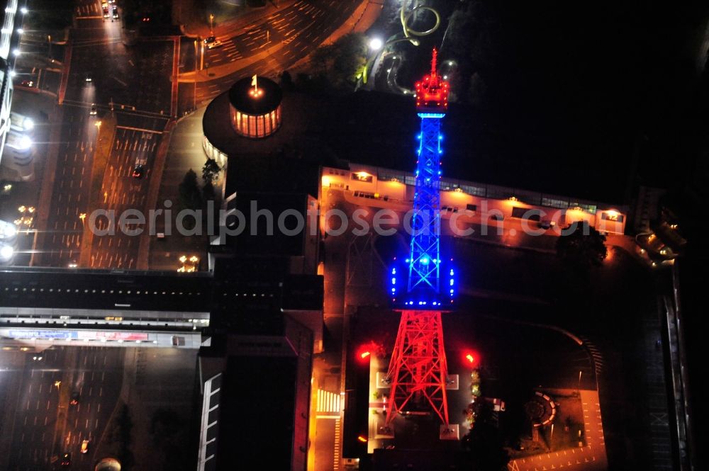 Aerial photograph Berlin - Festival of Lights downtown of the capital Berlin. Of October 10th to 21th numerous tourist and cultural attractions of the city are enveloped in a colorful light show. To be seen in the picture is the radio tower on the exhibition grounds in the district Charlottenburg