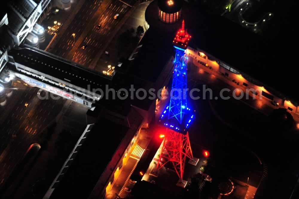 Berlin from the bird's eye view: Festival of Lights downtown of the capital Berlin. Of October 10th to 21th numerous tourist and cultural attractions of the city are enveloped in a colorful light show. To be seen in the picture is the radio tower on the exhibition grounds in the district Charlottenburg