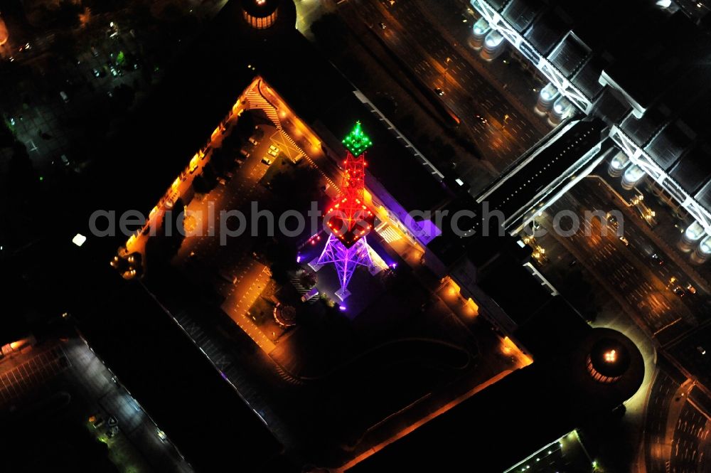 Aerial image Berlin - Festival of Lights downtown of the capital Berlin. Of October 10th to 21th numerous tourist and cultural attractions of the city are enveloped in a colorful light show. To be seen in the picture is the radio tower on the exhibition grounds in the district Charlottenburg