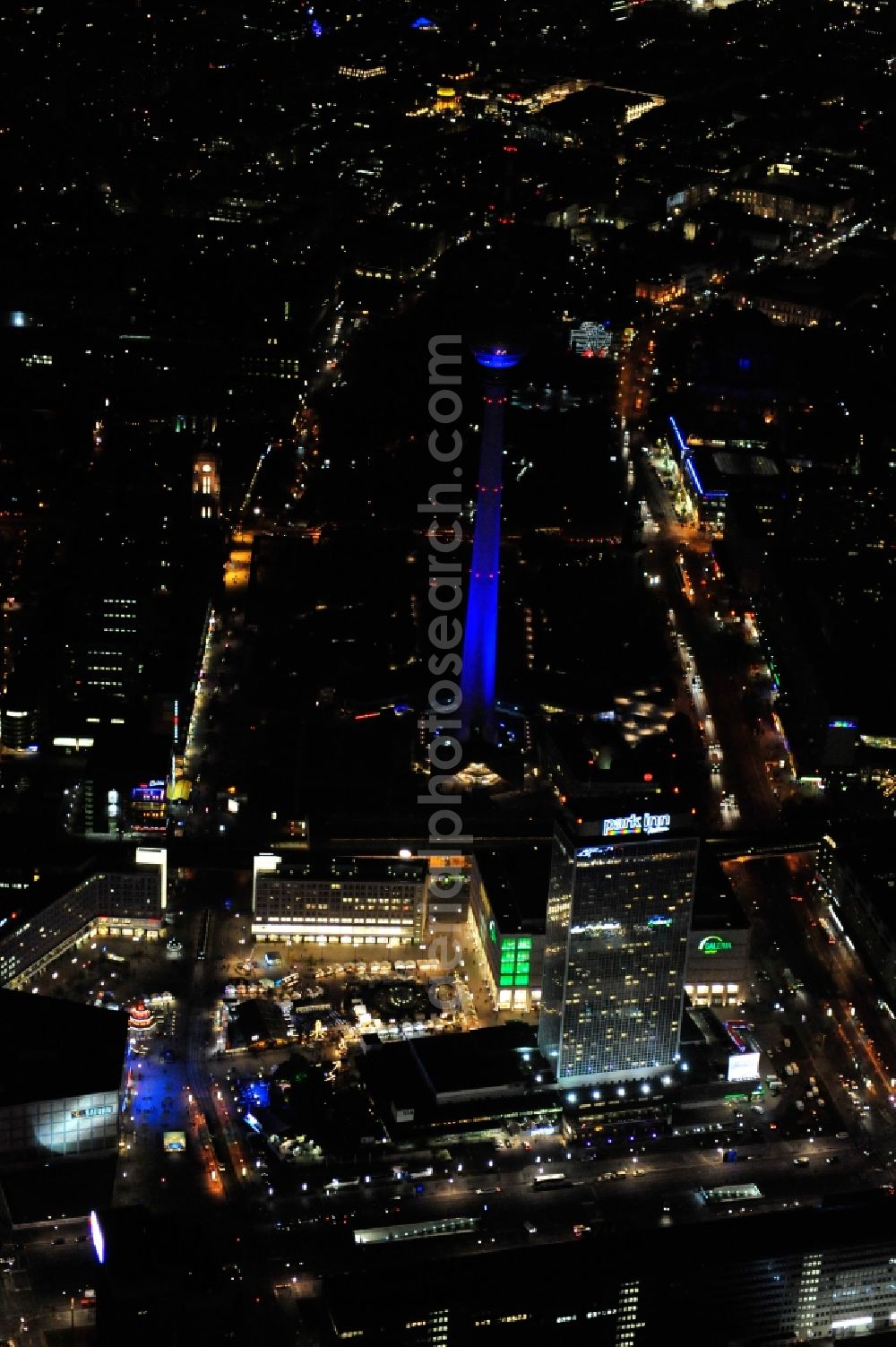 Berlin from the bird's eye view: Festival of Lights downtown of the capital Berlin. Of October 10th to 21th numerous tourist and cultural attractions of the city are enveloped in a colorful light show. To be seen in the picture is the TV tower and the Alexanderplatz