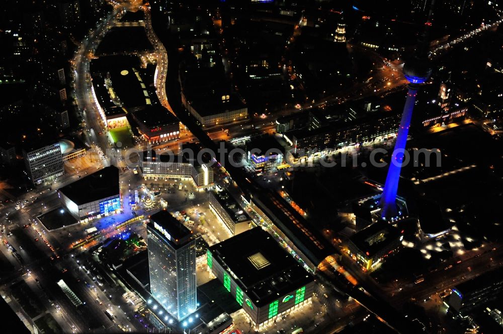 Berlin from above - Festival of Lights downtown of the capital Berlin. Of October 10th to 21th numerous tourist and cultural attractions of the city are enveloped in a colorful light show. To be seen in the picture is the TV tower and the Alexanderplatz