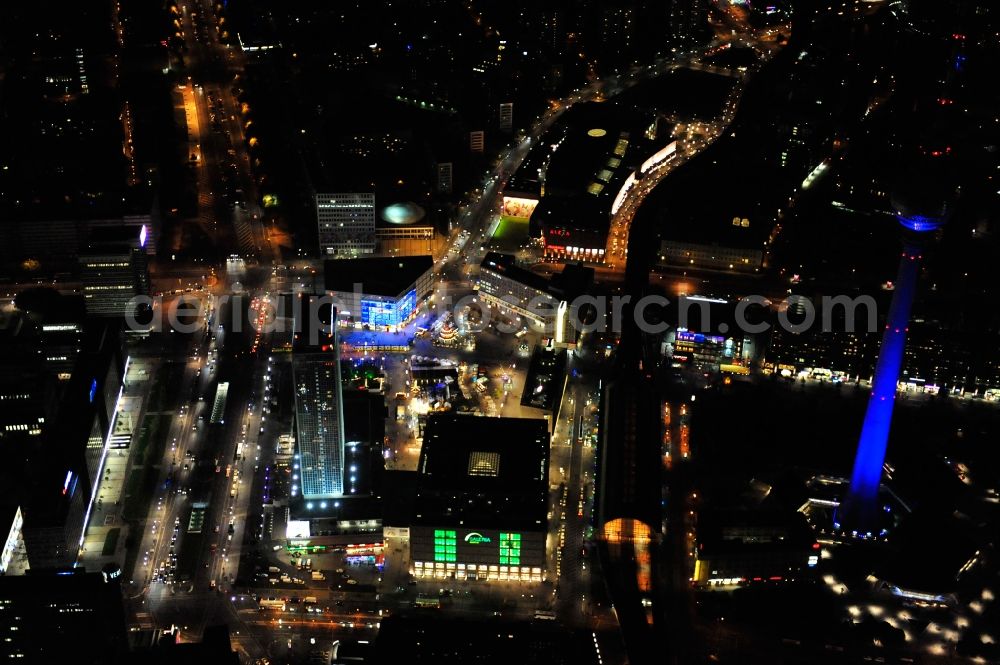 Berlin from above - Festival of Lights downtown of the capital Berlin. Of October 10th to 21th numerous tourist and cultural attractions of the city are enveloped in a colorful light show. To be seen in the picture is the TV tower and the Alexanderplatz