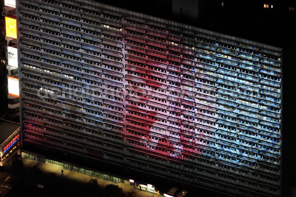 Berlin from above - Festival of Lights downtown of the capital Berlin. Of October 10th to 21th numerous tourist and cultural attractions of the city are enveloped in a colorful light show. To be seen in the picture is the Berliner Verlag