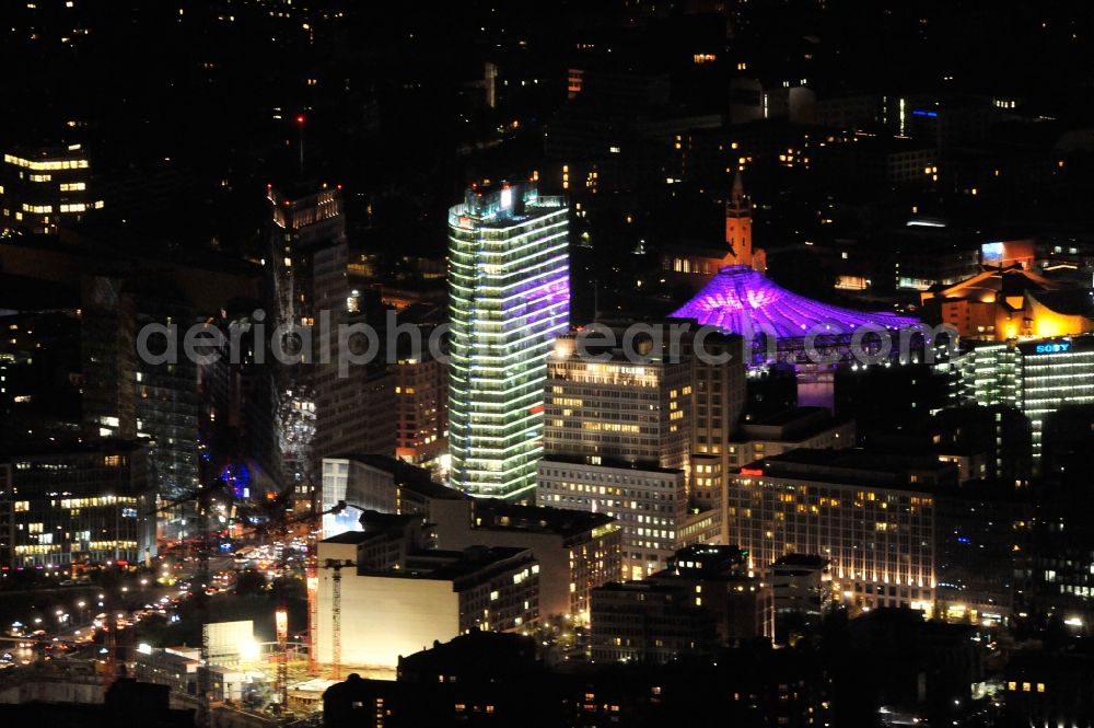 Berlin from the bird's eye view: Festival of Lights downtown of the capital Berlin. Of October 10th to 21th numerous tourist and cultural attractions of the city are enveloped in a colorful light show. To be seen in the picture is the Sony Center and the Potsdamer Platz