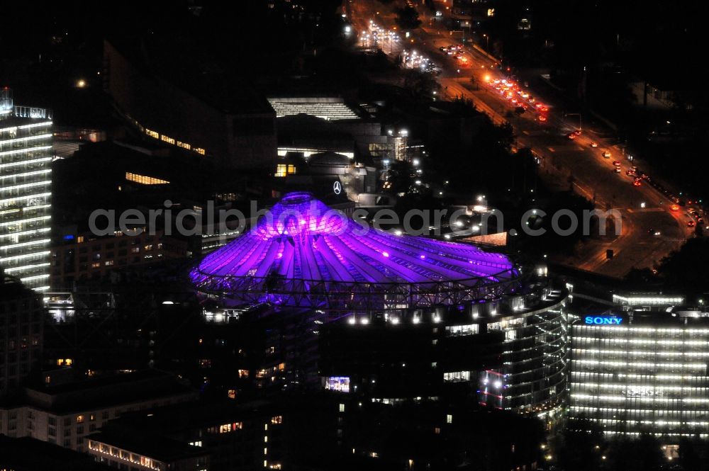 Berlin from the bird's eye view: Festival of Lights downtown of the capital Berlin. Of October 10th to 21th numerous tourist and cultural attractions of the city are enveloped in a colorful light show. To be seen in the picture is the Sony Center and the Potsdamer Platz