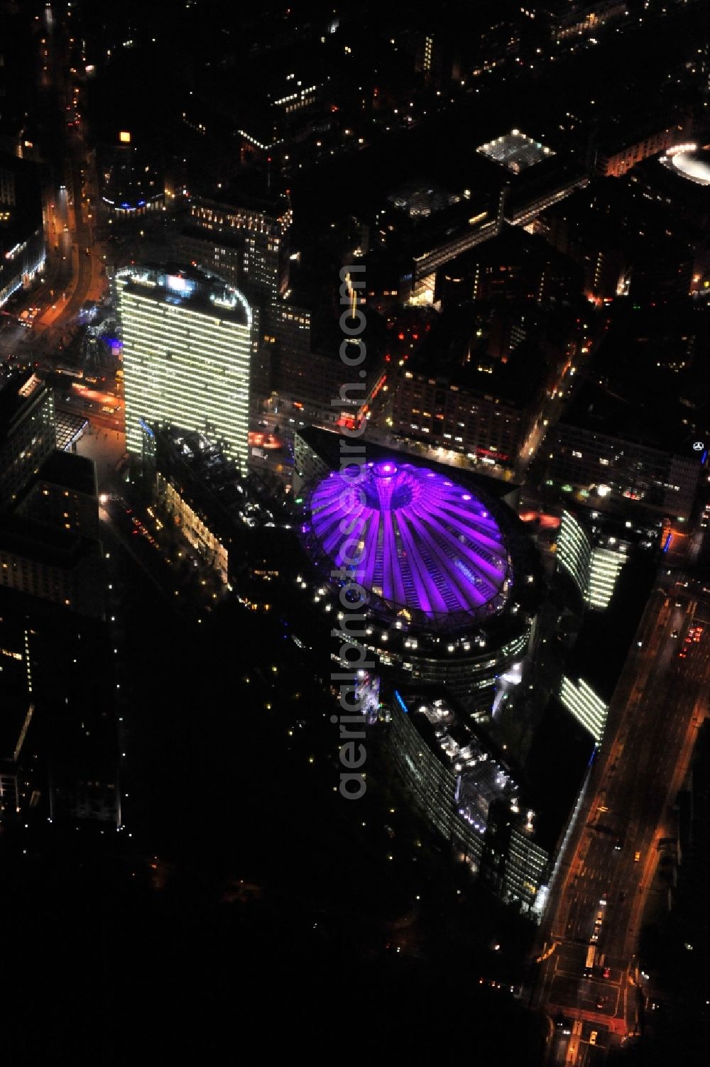 Aerial image Berlin - Festival of Lights downtown of the capital Berlin. Of October 10th to 21th numerous tourist and cultural attractions of the city are enveloped in a colorful light show. To be seen in the picture is the Sony Center and the Potsdamer Platz