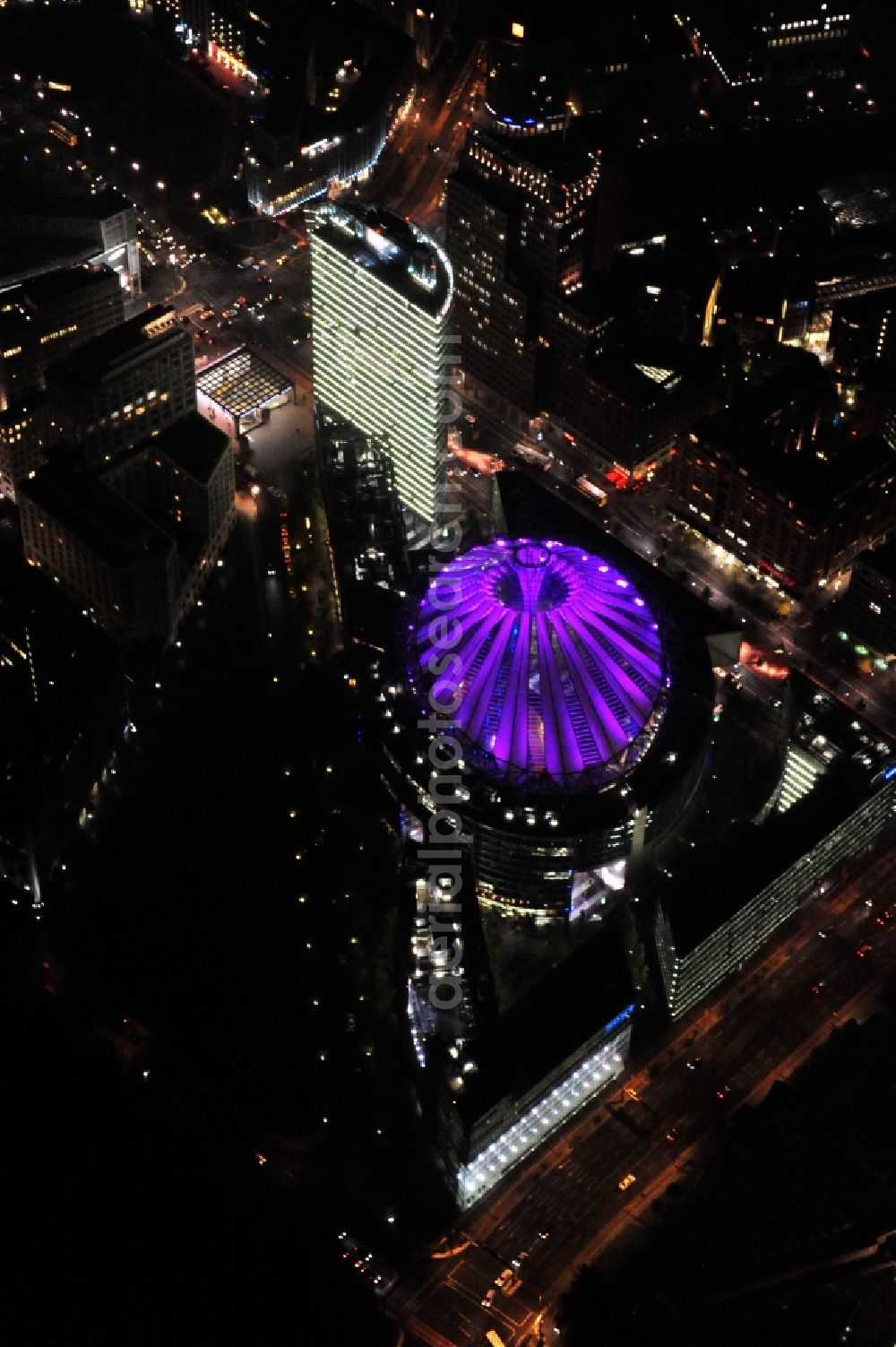 Aerial photograph Berlin - Festival of Lights downtown of the capital Berlin. Of October 10th to 21th numerous tourist and cultural attractions of the city are enveloped in a colorful light show. To be seen in the picture is the Sony Center and the Potsdamer Platz