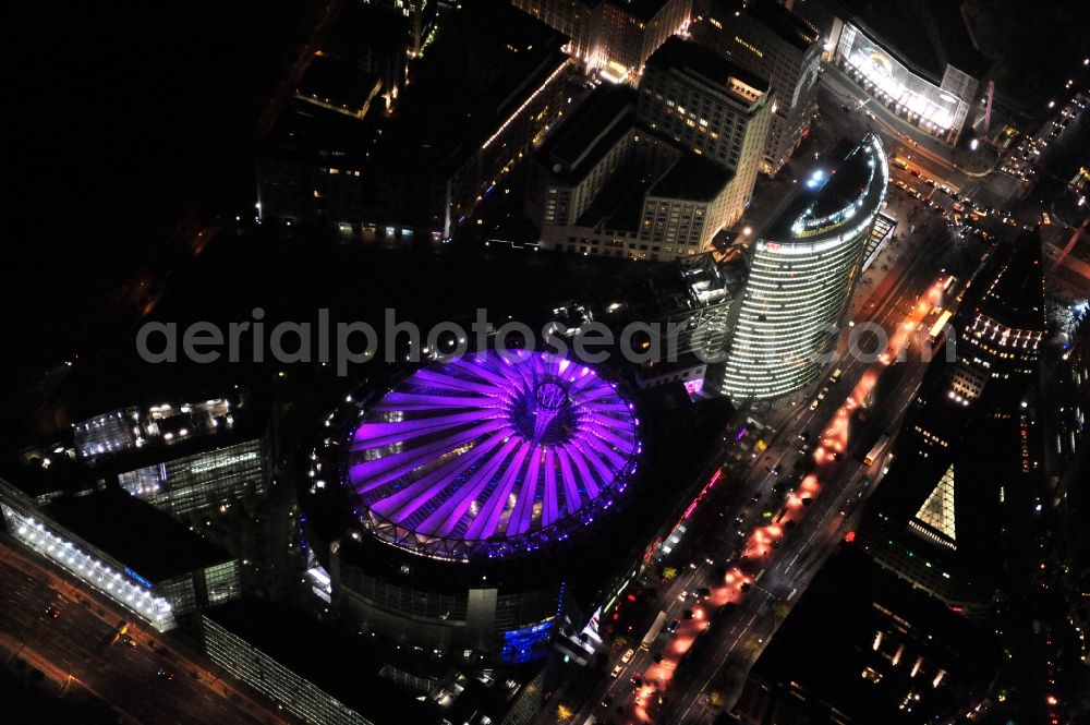 Berlin from the bird's eye view: Festival of Lights downtown of the capital Berlin. Of October 10th to 21th numerous tourist and cultural attractions of the city are enveloped in a colorful light show. To be seen in the picture is the Sony Center and the Potsdamer Platz