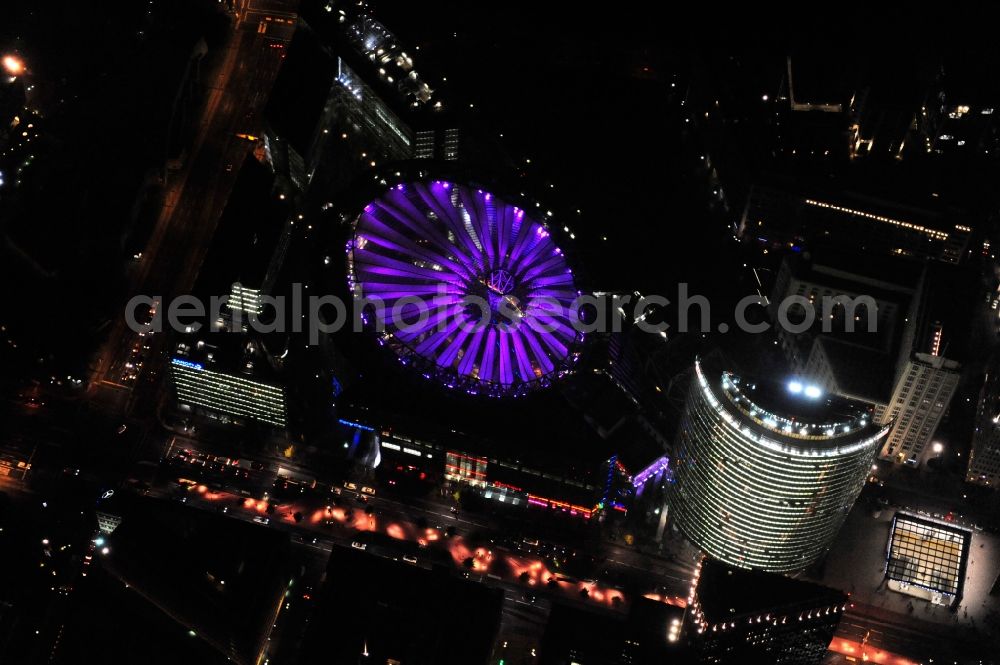 Aerial image Berlin - Festival of Lights downtown of the capital Berlin. Of October 10th to 21th numerous tourist and cultural attractions of the city are enveloped in a colorful light show. To be seen in the picture is the Sony Center and the Potsdamer Platz