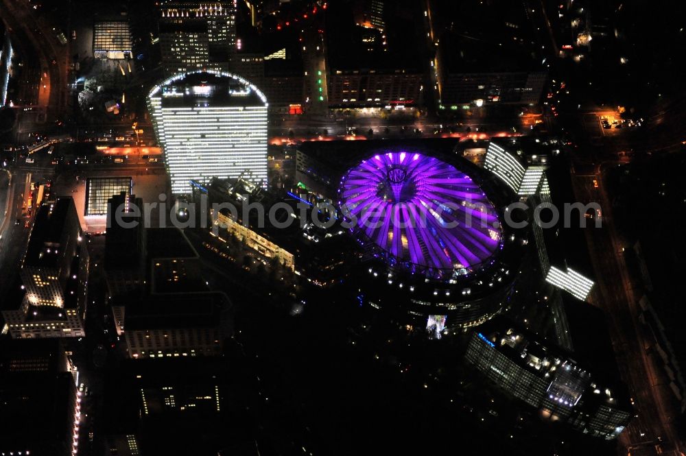 Berlin from the bird's eye view: Festival of Lights downtown of the capital Berlin. Of October 10th to 21th numerous tourist and cultural attractions of the city are enveloped in a colorful light show. To be seen in the picture is the Sony Center and the Potsdamer Platz