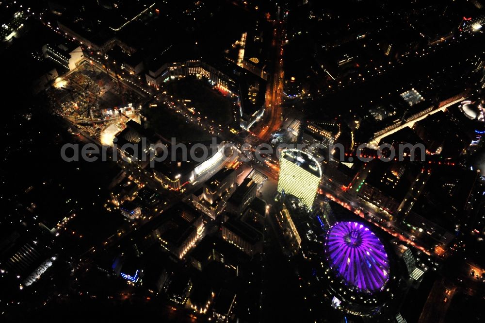 Aerial image Berlin - Festival of Lights downtown of the capital Berlin. Of October 10th to 21th numerous tourist and cultural attractions of the city are enveloped in a colorful light show. To be seen in the picture is the Sony Center and the Potsdamer Platz