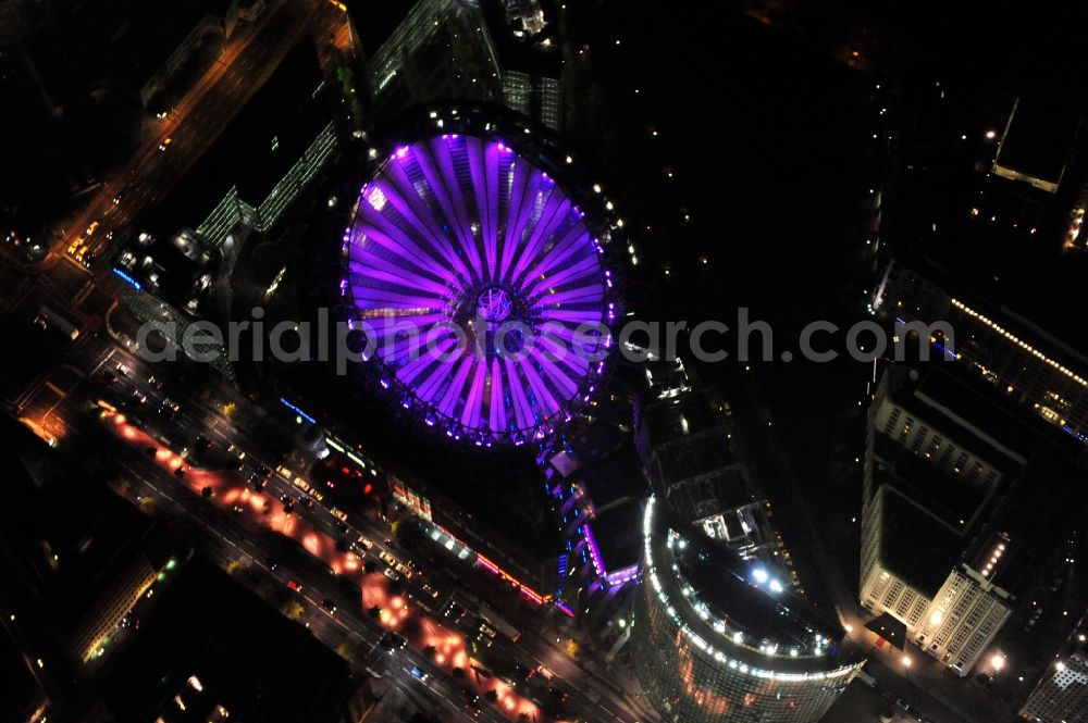 Berlin from the bird's eye view: Festival of Lights downtown of the capital Berlin. Of October 10th to 21th numerous tourist and cultural attractions of the city are enveloped in a colorful light show. To be seen in the picture is the Sony Center and the Potsdamer Platz