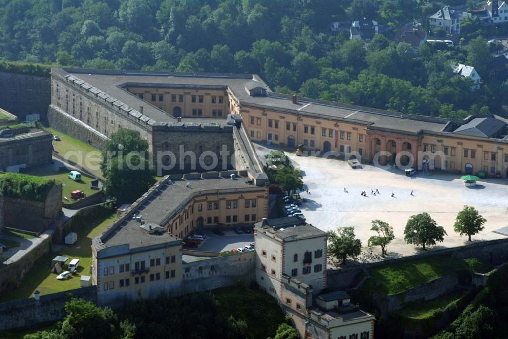 Aerial image Koblenz - Blick auf die Festung Ehrenbreitstein, sie ist eine seit dem 16. Jahrhundert bestehende, ursprünglich kurtrierische, später preußische Befestigungsanlage gegenüber der Moselmündung bei Koblenz.Ihr barocker Vorgängerbau, der auf eine um das Jahr 1000 errichtete Burg zurückging, war zeitweilig Residenz der Kurfürsten von Trier und wurde 1801 von französischen Revolutionstruppen gesprengt. In ihrer heutigen Gestalt wurde die Festung zwischen 1817 und 1828 unter Leitung des preußischen Ingenieur-Offiziers Carl Schnitzler neu errichtet. Von der preußischen Armee bis 1918 militärisch genutzt, diente die Feste Ehrenbreitstein im System der Koblenzer Festungswerke der Sicherung des Mittelrheintals und der Flussübergänge bei Koblenz. Heute ist sie Eigentum des Landes Rheinland-Pfalz und beherbergt das Landesmuseum Koblenz, die Koblenzer Jugendherberge, das Ehrenmal des Heeres sowie verschiedene Verwaltungsstellen. Seit 2002 ist die Festung Teil des UNESCO-Weltkulturerbes „Oberes Mittelrheintal“.