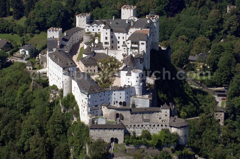 Aerial image Salzburg - Die 900 Jahre alte Festung Hohensalzburg, das Wahrzeichen der Stadt, ist Europas größte und noch am besten erhaltene Burganlage. Heute gilt sie als Europas größte Festungsanlage mit mehr als 14.000 m² Baufläche. Salzburg 2007/07/14 Festung Hohensalzburg is a castle in the Austrian city of Salzburg. It sits on Festungberg hill. With a length of 250 meters and a width of 150 meters, it is one of the largest medieval castles in Europe.