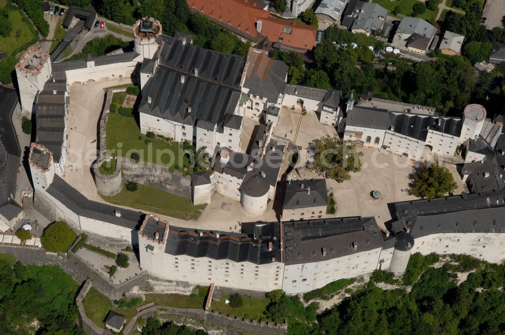 Aerial photograph SALZBURG - Die 900 Jahre alte Festung Hohensalzburg, das Wahrzeichen der Stadt, ist Europas größte und noch am besten erhaltene Burganlage. Heute gilt sie als Europas größte Festungsanlage mit mehr als 14.000 m² Baufläche. Salzburg 2007/07/14 Festung Hohensalzburg is a castle in the Austrian city of Salzburg. It sits on Festungberg hill. With a length of 250 meters and a width of 150 meters, it is one of the largest medieval castles in Europe.