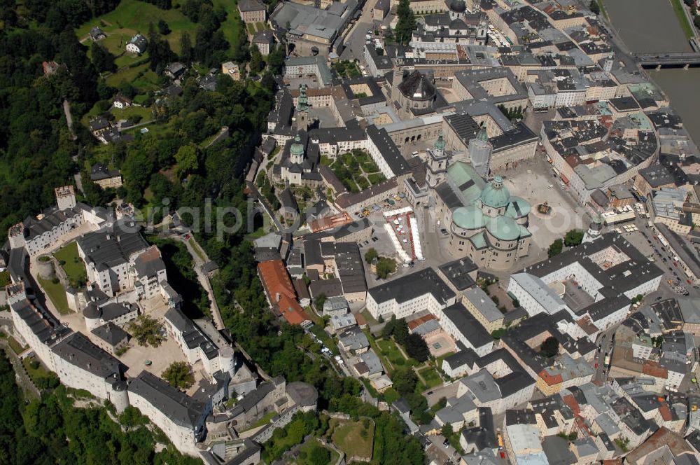 SALZBURG from the bird's eye view: Die 900 Jahre alte Festung Hohensalzburg, das Wahrzeichen der Stadt, ist Europas größte und noch am besten erhaltene Burganlage. Heute gilt sie als Europas größte Festungsanlage mit mehr als 14.000 m² Baufläche. Salzburg 2007/07/14 Festung Hohensalzburg is a castle in the Austrian city of Salzburg. It sits on Festungberg hill. With a length of 250 meters and a width of 150 meters, it is one of the largest medieval castles in Europe.