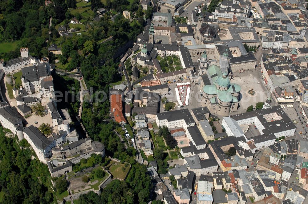 Aerial image SALZBURG - Die 900 Jahre alte Festung Hohensalzburg, das Wahrzeichen der Stadt, ist Europas größte und noch am besten erhaltene Burganlage. Heute gilt sie als Europas größte Festungsanlage mit mehr als 14.000 m² Baufläche. Salzburg 2007/07/14 Festung Hohensalzburg is a castle in the Austrian city of Salzburg. It sits on Festungberg hill. With a length of 250 meters and a width of 150 meters, it is one of the largest medieval castles in Europe.