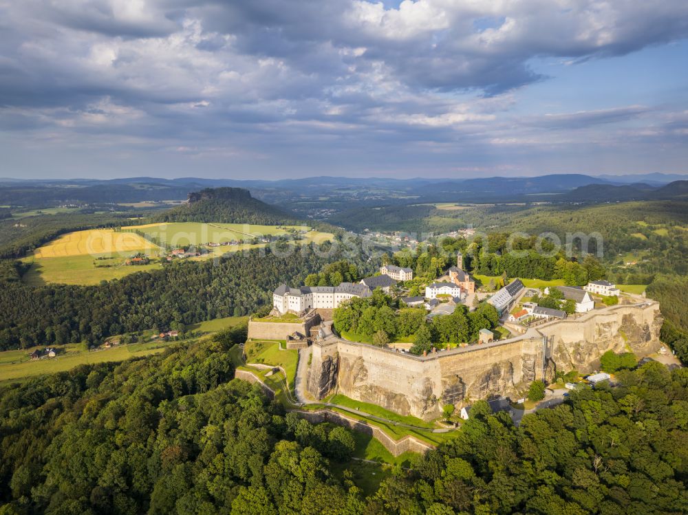 Aerial image Königstein - The Fortress Koenigstein at the river Elbe in the county district of Saxon Switzerland East Erzgebirge in the state of Saxony. The fortress is one of the largest mountain fortresses in Europe and is located amidst the Elbe sand stone mountains on the flat top mountain of the same name