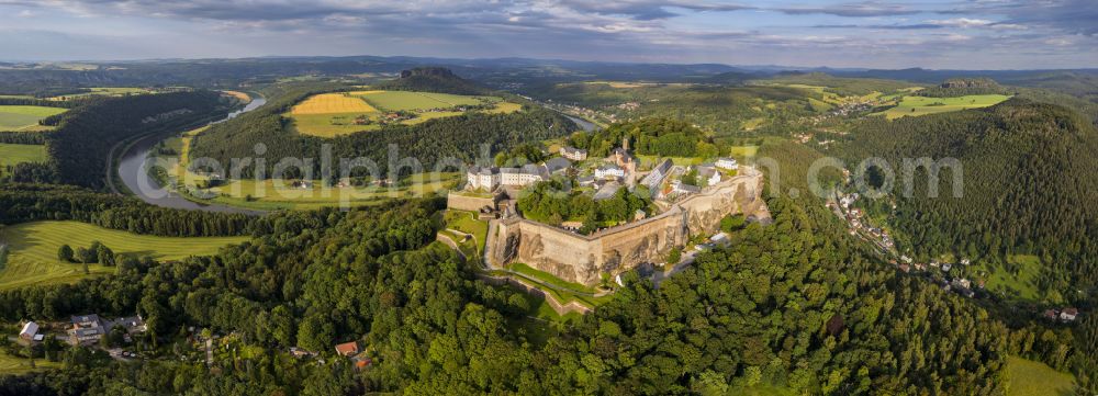 Königstein from above - The Fortress Koenigstein at the river Elbe in the county district of Saxon Switzerland East Erzgebirge in the state of Saxony. The fortress is one of the largest mountain fortresses in Europe and is located amidst the Elbe sand stone mountains on the flat top mountain of the same name