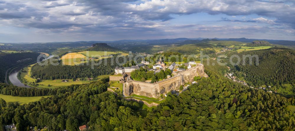 Aerial image Königstein - The Fortress Koenigstein at the river Elbe in the county district of Saxon Switzerland East Erzgebirge in the state of Saxony. The fortress is one of the largest mountain fortresses in Europe and is located amidst the Elbe sand stone mountains on the flat top mountain of the same name