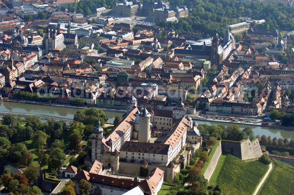 Aerial photograph Würzburg - Blick auf die Festung Marienberg mit Museen in Würzburg. Die Festung wurde im Laufe der Geschichte mehrfach umgebaut. Die ältesten noch erhaltenen Teile sind von 704. Bei der Bombardierung Würzburgs am 16. März 1945 wurde die Festung stark beschädigt und ab 1950 wieder aufgebaut. Heute beherbergt sie das Mainfränkische Museum Würzburg sowie das Fürstenbaumuseum. Kontakt Festung: Festung Marienberg, Nr. 239, 97082 Würzburg, Tel. +49(0)931 3551750; Kontakt Museen: Mainfränkisches Museum Würzburg, Festung Marienberg, Oberer Burgweg, 97082 Würzburg, Tel. +49(0)931 20594 0, Fax +49(0)931 20594 56, Email: sekretariat@mainfraenkisches-museum.de