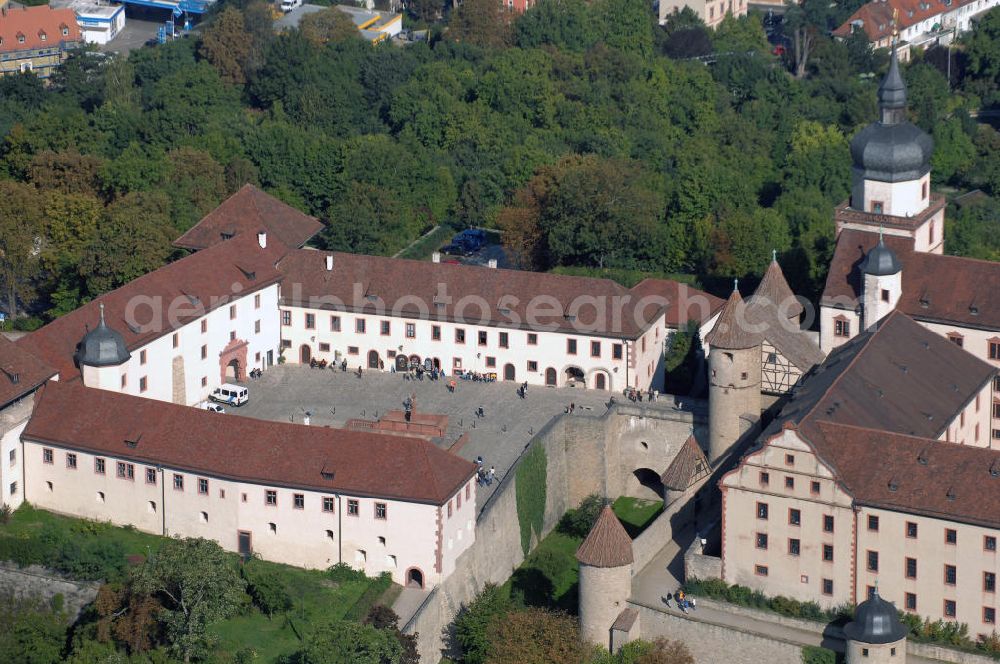 Aerial image Würzburg - Blick auf die Festung Marienberg mit Museen in Würzburg. Die Festung wurde im Laufe der Geschichte mehrfach umgebaut. Die ältesten noch erhaltenen Teile sind von 704. Bei der Bombardierung Würzburgs am 16. März 1945 wurde die Festung stark beschädigt und ab 1950 wieder aufgebaut. Heute beherbergt sie das Mainfränkische Museum Würzburg sowie das Fürstenbaumuseum. Kontakt Festung: Festung Marienberg, Nr. 239, 97082 Würzburg, Tel. +49(0)931 3551750; Kontakt Museen: Mainfränkisches Museum Würzburg, Festung Marienberg, Oberer Burgweg, 97082 Würzburg, Tel. +49(0)931 20594 0, Fax +49(0)931 20594 56, Email: sekretariat@mainfraenkisches-museum.de