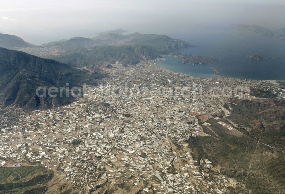 Fethiye from the bird's eye view: County town on the Gulf of Fethiye in Turkey. The plants for vegetable growing