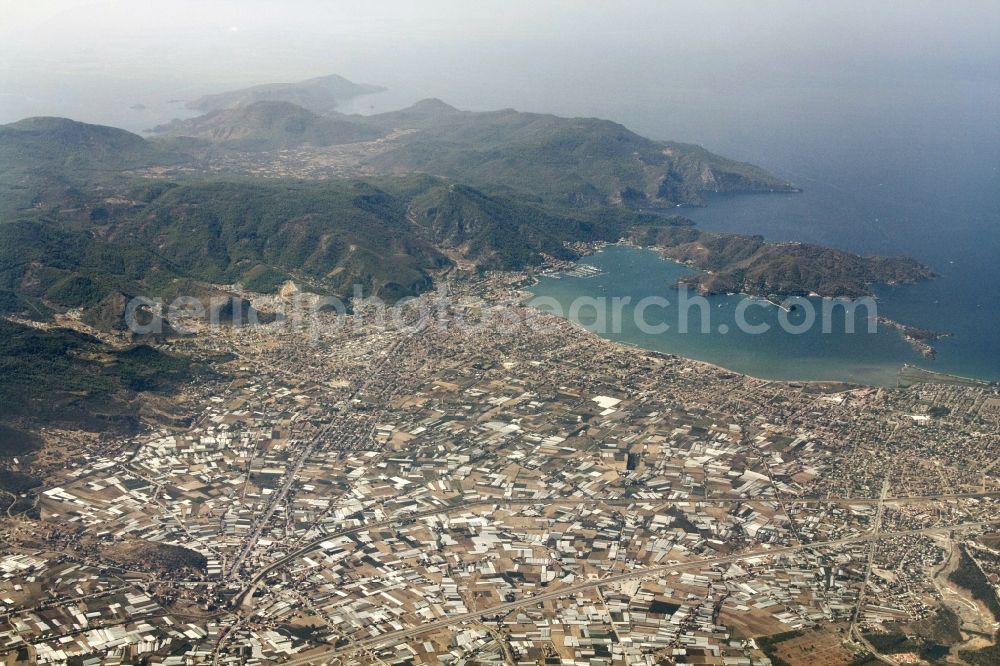 Aerial image Fethiye - County town on the Gulf of Fethiye in Turkey. The plants for vegetable growing