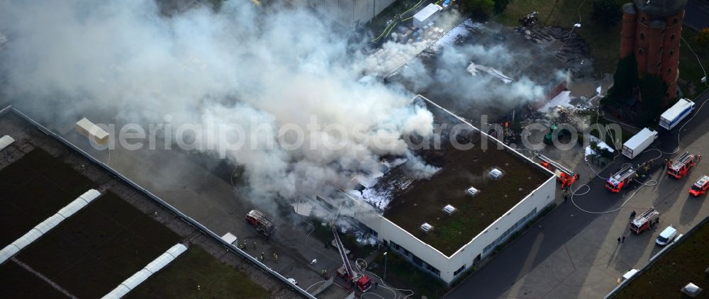 Berlin from above - Fire - use to control a large - fire in a warehouse in the industrial and commercial area to the Gaußstraße in Charlottenburg in Berlin