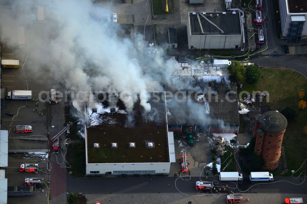 Aerial photograph Berlin - Fire - use to control a large - fire in a warehouse in the industrial and commercial area to the Gaußstraße in Charlottenburg in Berlin