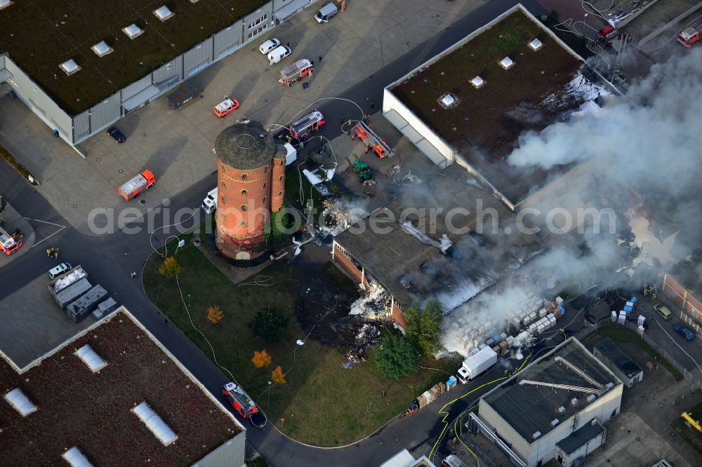 Aerial photograph Berlin - Fire - use to control a large - fire in a warehouse in the industrial and commercial area to the Gaußstraße in Charlottenburg in Berlin