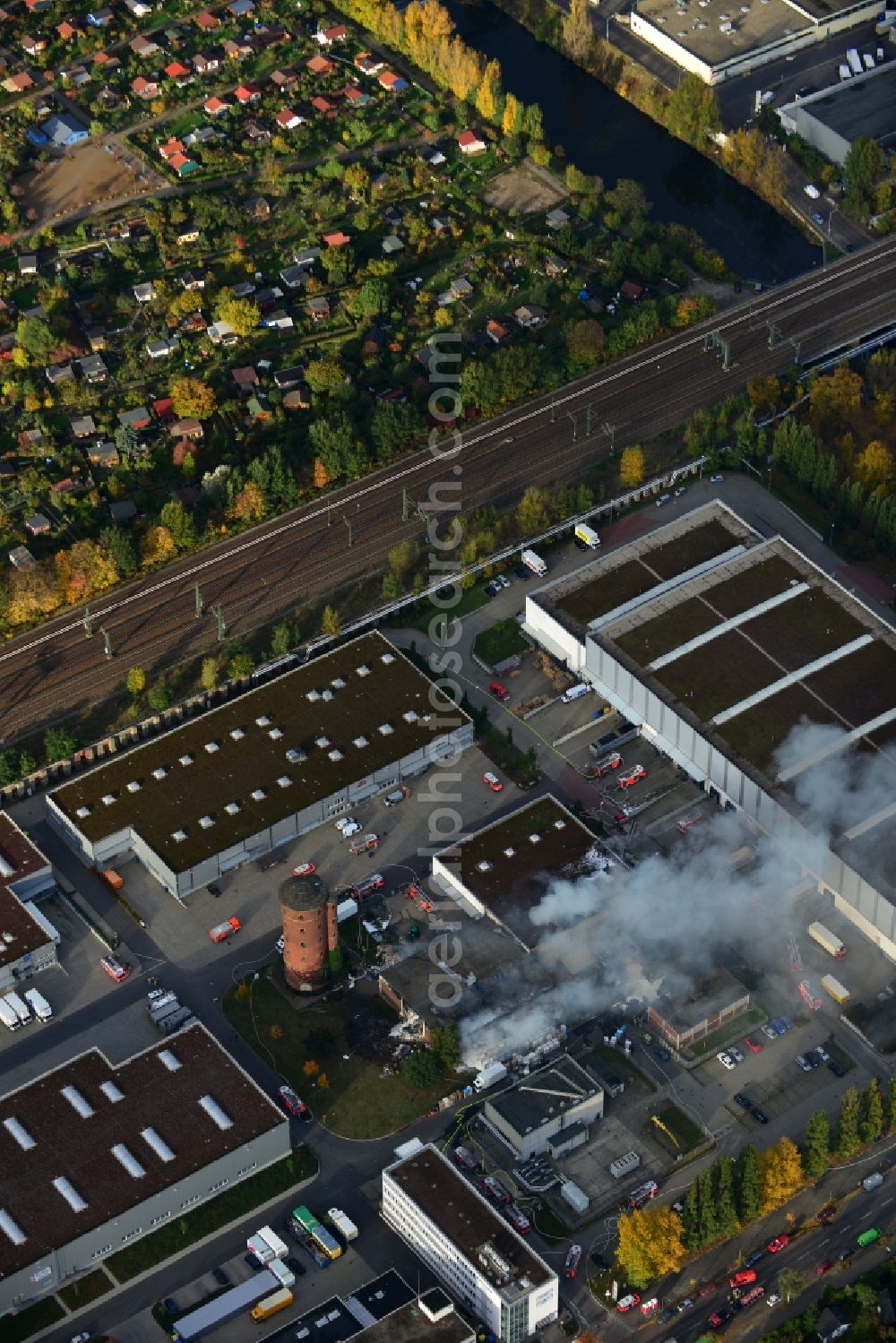 Berlin from above - Fire - use to control a large - fire in a warehouse in the industrial and commercial area to the Gaußstraße in Charlottenburg in Berlin