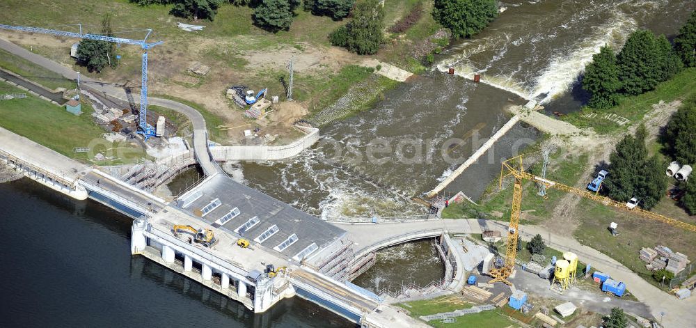 Spremberg from the bird's eye view: Öffnung der Schleusentore an der Talsperre Spremberg. Das kontrollierte Ablaufen der aufgestauten Spree soll größere Überschwemmungen vor allem in Cottbus verhindern. Opening of the flood gates at the Spremberg Reservoir. The controlled drainage of the dammed Spree River is to prevent major floods, particularly in Cottbus.