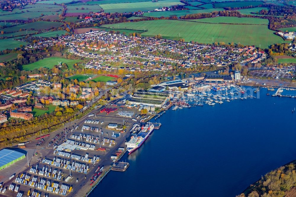 Ivendorf from the bird's eye view: Ferry port facilities on the seashore Luebeck Travemuende on Trave in Ivendorf in the state Schleswig-Holstein, Germany