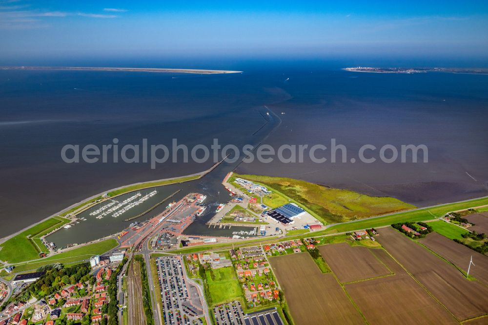 Norden from the bird's eye view: Ferry port facilities on the sea coast of the North Sea with the ferry Frisia 4 in the district of Norddeich in Norden in the state of Lower Saxony, Germany