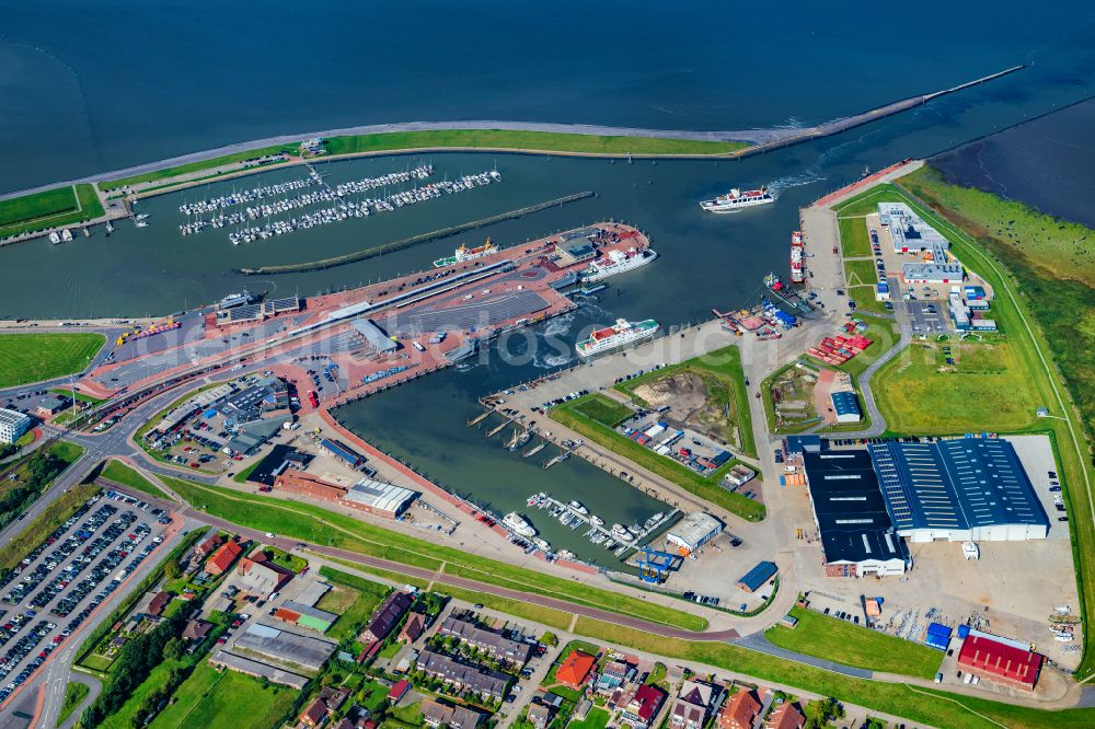 Norden from above - Ferry port facilities on the sea coast of the North Sea with the ferry Frisia 4 in the district of Norddeich in Norden in the state of Lower Saxony, Germany