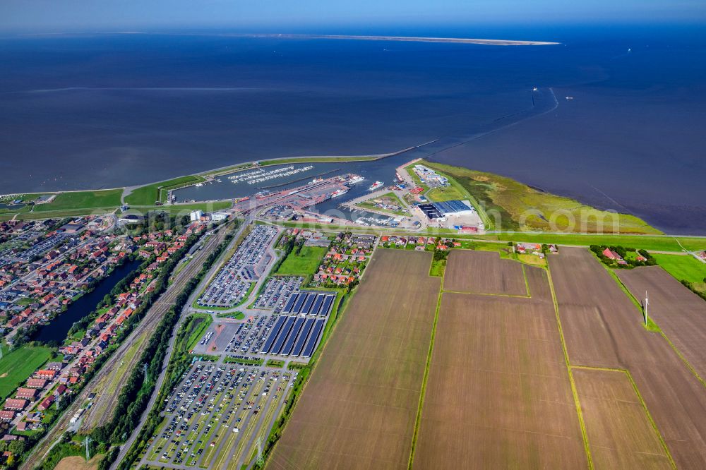 Aerial image Norden - Ferry port facilities on the sea coast of the North Sea with the ferry Frisia 4 in the district of Norddeich in Norden in the state of Lower Saxony, Germany