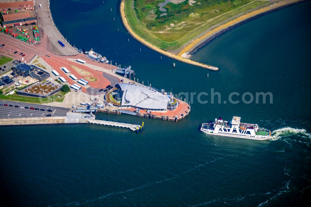 Norderney from above - Faehr- Hafenanlagen an der Meeres- Kueste der Nordseeinsel Norderney Mit den Faehrschiff Frisia III im Bundesland Niedersachsen, Deutschlan