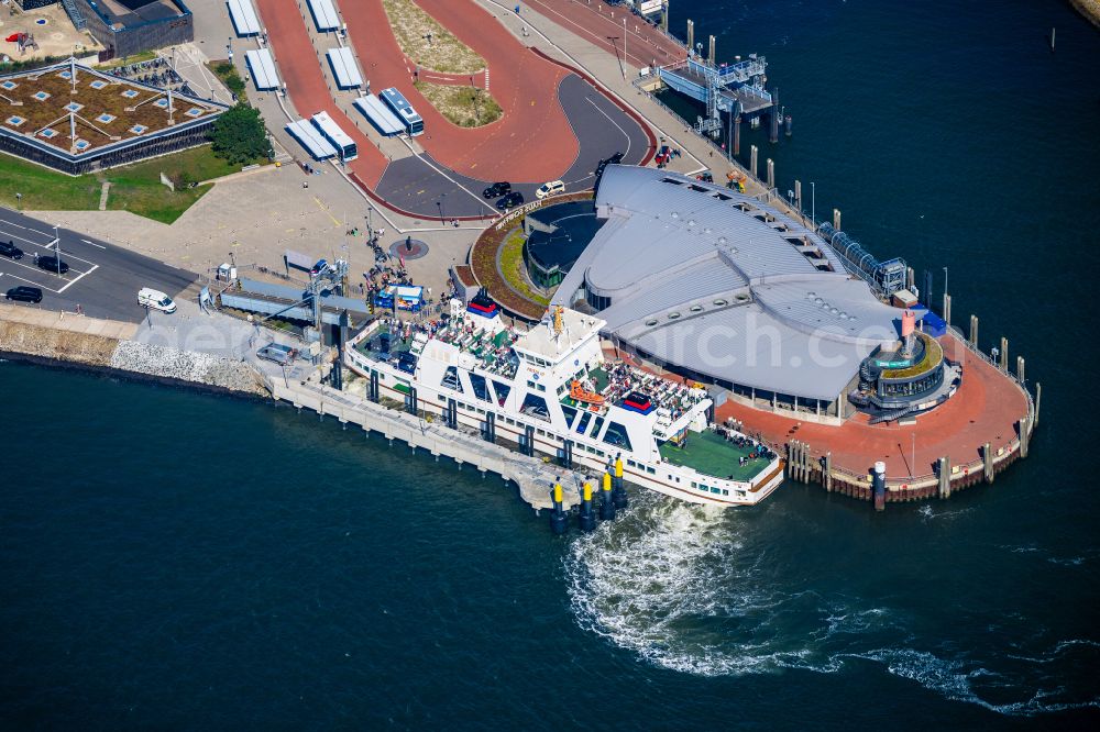 Aerial image Norderney - Faehr- Hafenanlagen an der Meeres- Kueste der Nordseeinsel Norderney Mit den Faehrschiff Frisia III im Bundesland Niedersachsen, Deutschlan